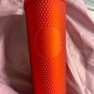 Red studded Starbucks 24 oz cup